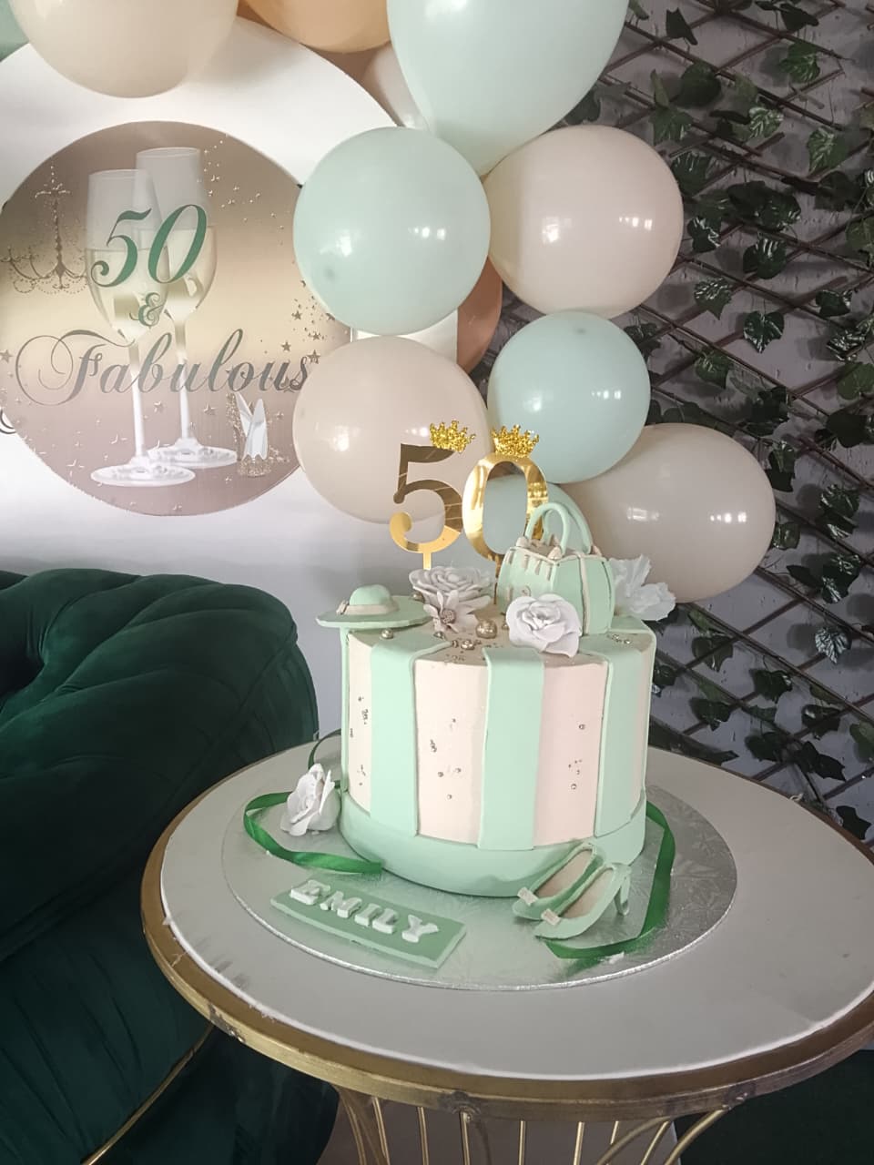 Matching cake and green décor styling